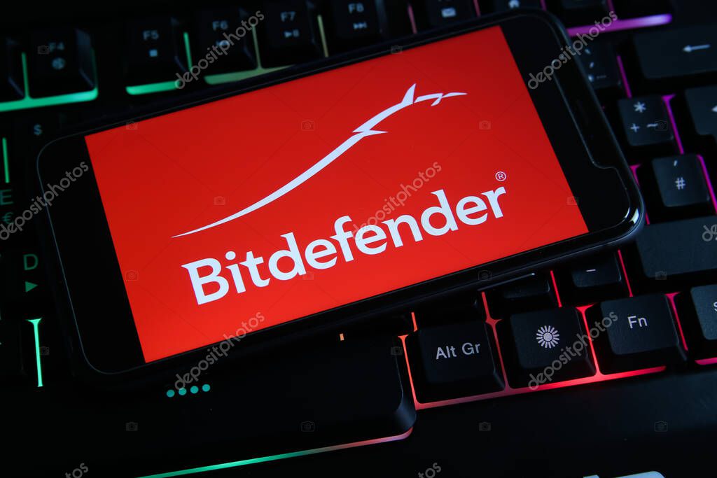 Viersen, Germany - May 9. 2021: Closeup of smartphone with logo lettering of bitdefender security software on computer keyboard